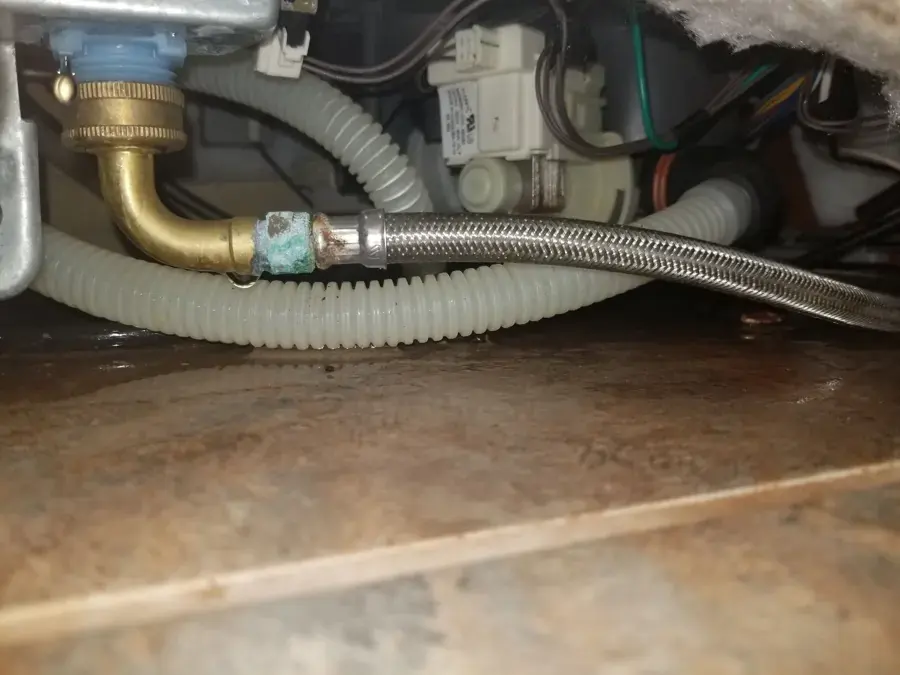 Braided supply line and brass fitting leaking under a Brooksville dishwasher